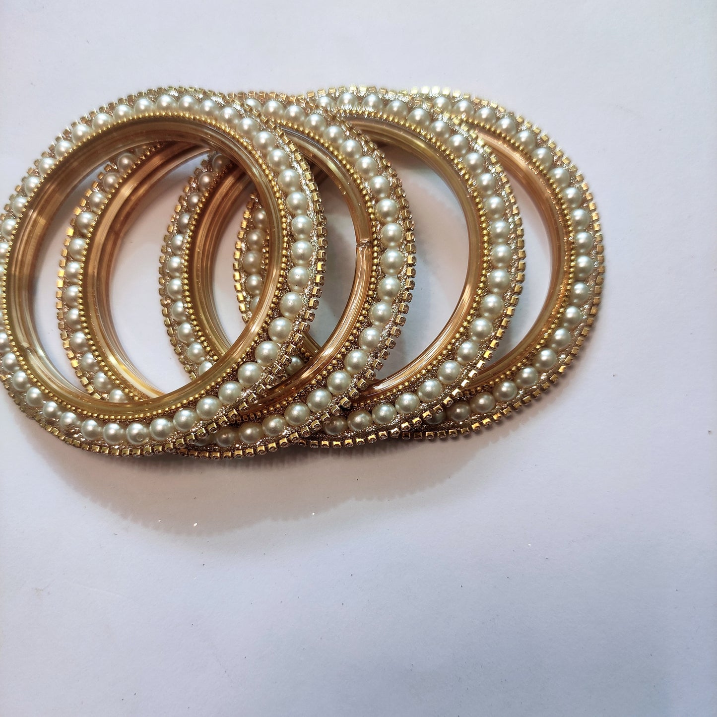 Elegant Gold-Plated Pearl Metal Bangles